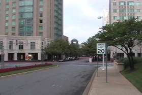 Turn right at the next street (Market St) and follow the sidewalk.