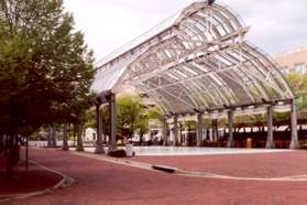 Turn left at Fountain Square and follow the brick walkway next to the hotel.