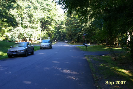 The asphalt path ends at Blue Smoke Tr.  Turn right and walk along that road to Soapstone Dr.