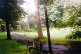 Trail makes a sharp left and follows along side of golf course.