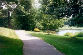 The trail passes Links Pond on the right.  Do not take narrow path to the left.