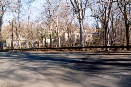 The sidewalk ends at the intersection with Edgevale Ter.  Continue on the side of the street with the woods on your right for a short block along Rock Creek Dr.