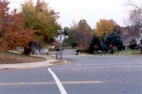 Continue across the next street, turn right and cross Electric Ave. and follow the sidewalk on the left side of Chestertown Dr.