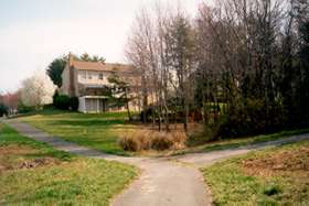 Take trail to right before the house pictured.