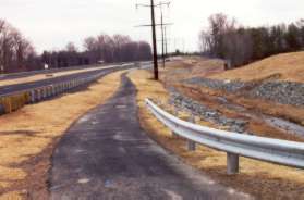 Follow the asphalt trail along the east side of the Pkwy