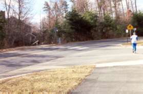 Just prior to Armstrong School take the crosswalk shown across Lake Newport Rd.