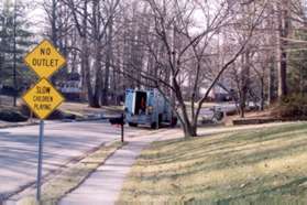 Turn right onto Blair Rd and follow the sidewalk to the next street.