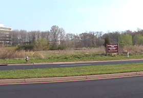 Look for the Sunrise Valley Park sign on the opposite side of Sunrise Valley Dr.  Cross the road to enter the park next to the left of the sign.