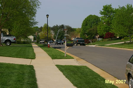 Turn left and follow the concrete sidewalk along Marble Rock Dr.