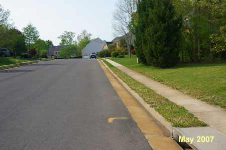 After crossing Edge Rock Dr. turn left to follow the sidewalk along that road.