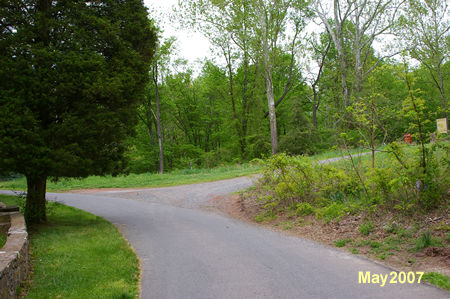 Turn right onto the gravel trail after the curve in the service road.