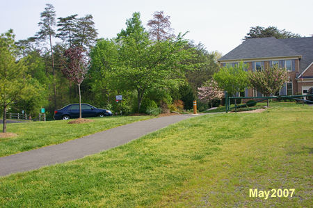 The trail intersects with Bare Island Dr. Cross that street and turn to the left.