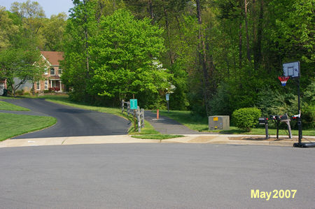 Take the trail next to the driveway at the end of the cul-de-sac.