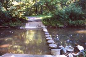 The trail crosses Sugarland Run on columns.  The slope of the ramp is fairly steep.