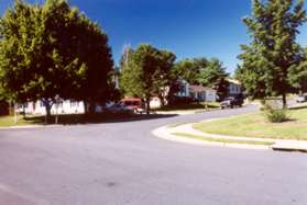 Turn right and follow the sidewalk on Shallow Ford Rd.