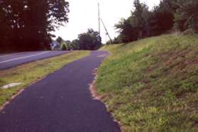 Continue along the asphalt trail along Sugarland Rd.