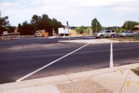 At Wiehle Ave turn right and cross the Fairfax County Pkwy.