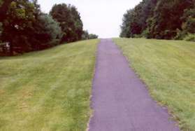 The trail follows the pipeline up the hill.