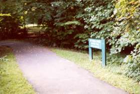 Just beyond the creek is a sign marking the Buttermilk Creek Trail.  Continue straight up the hill.