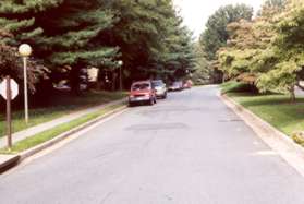 Turn right to follow the sidewalk along the left along Saffold Way.