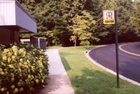 Turn left to follow the sidewalk west along North Shore Drive.