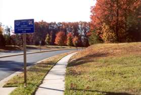 Cross Town Center Pwy at Baron Cameron Ave and turn left to follow Town Center Pwy.