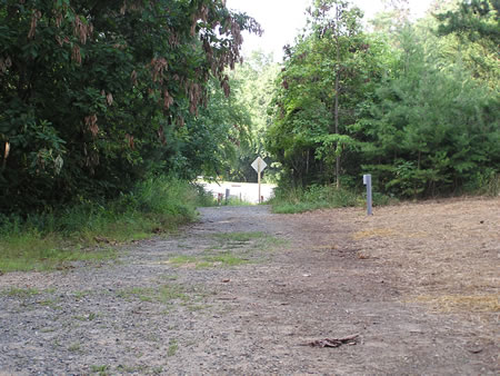 After climbing a steep hill the trail descends down to street level.