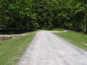 After the service road crosses the dam turn left onto an intersecting service road.